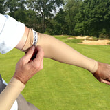 anti slip compression gripper on golf arm sleeves